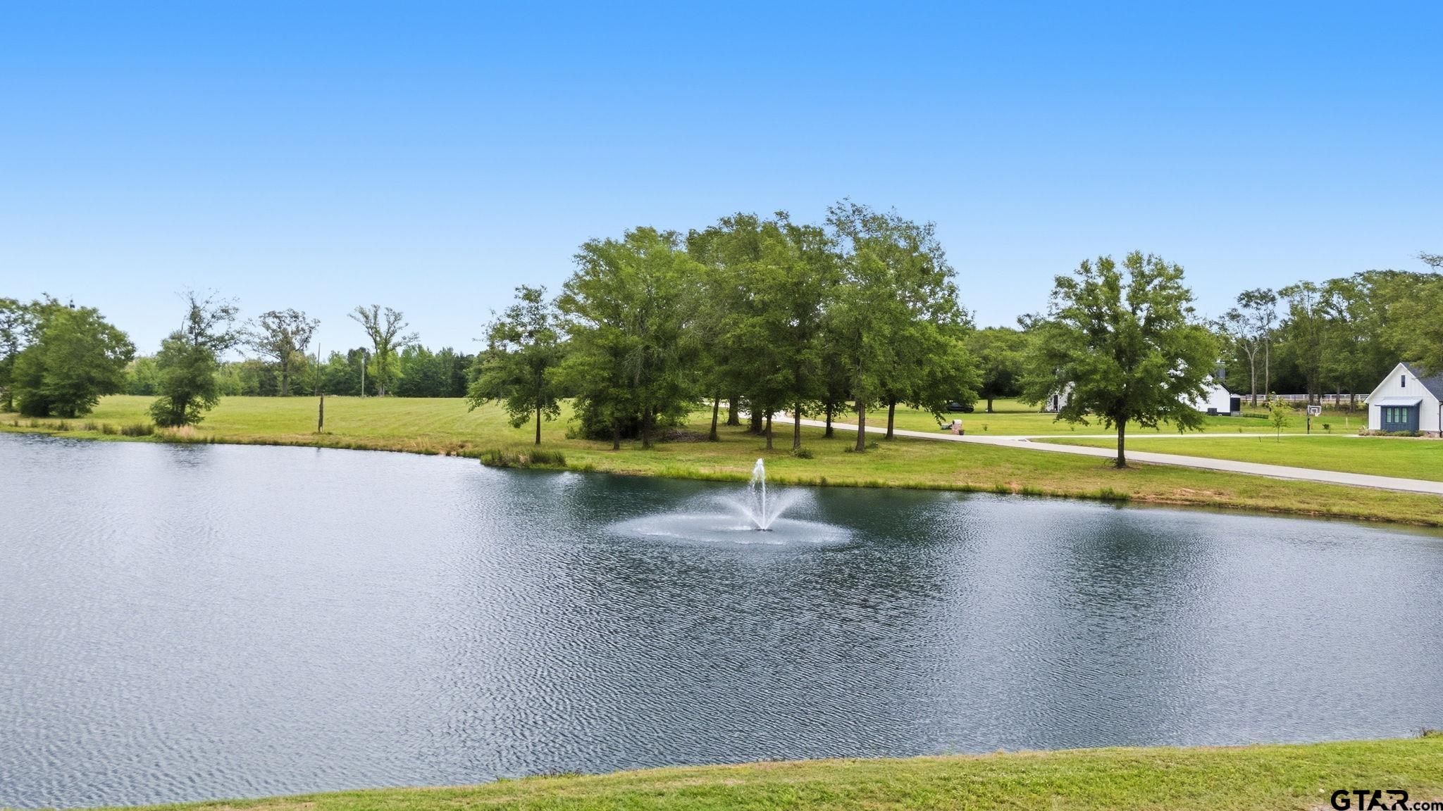 Lot 4 Deer Hvn Road Tyler, TX 75702 - Photo 4 of 11 a view of a swimming pool and a yard