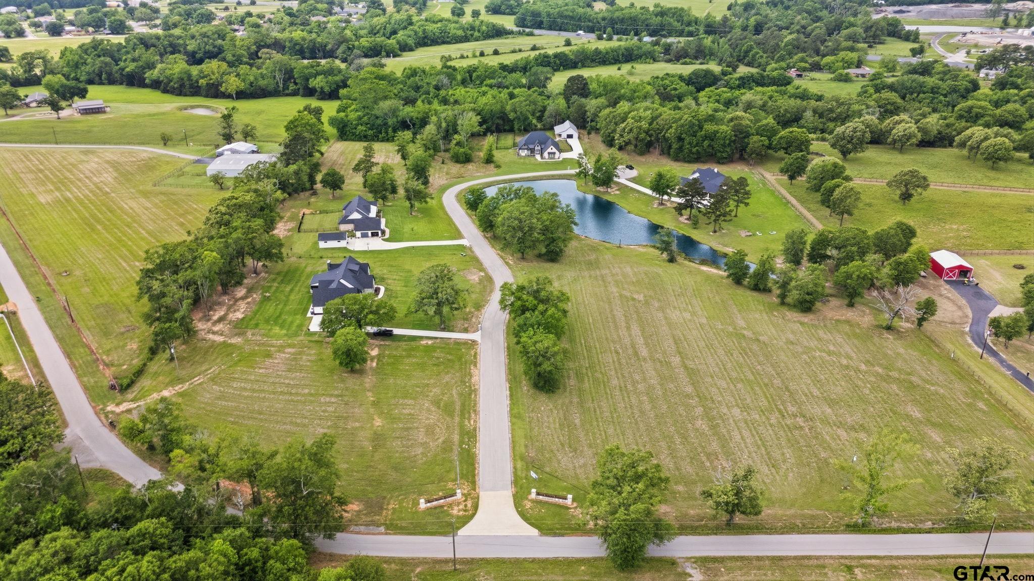 Lot 4 Deer Hvn Road Tyler, TX 75702 - Photo 8 of 11 an aerial view of residential house with outdoor space and swimming pool