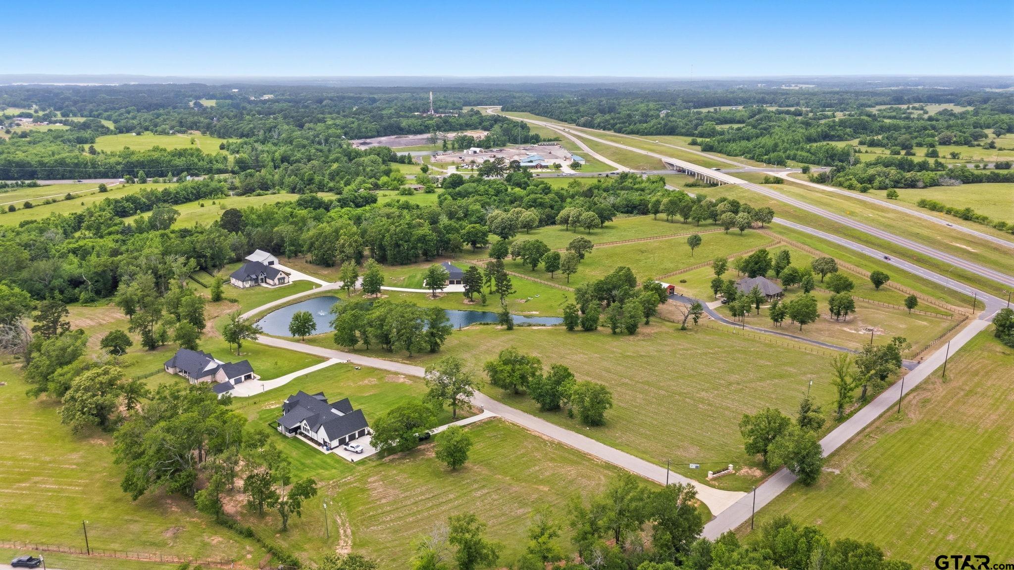Lot 4 Deer Hvn Road Tyler, TX 75702 - Photo 10 of 11 an aerial view of residential houses with outdoor space
