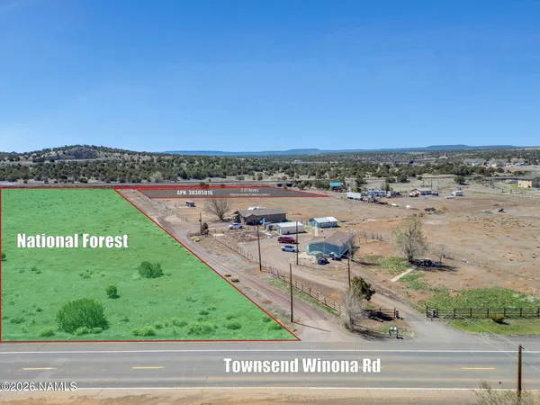 a view of an ocean and a mountain