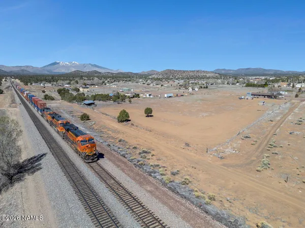 a view of beach and mountain