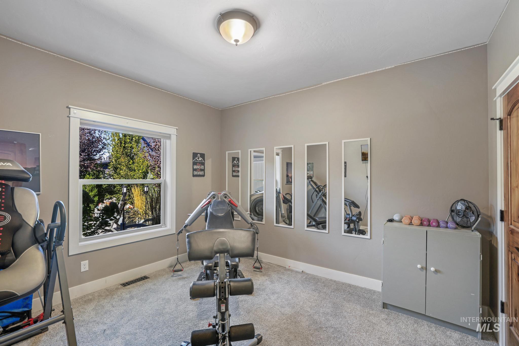 2043 Prospector Way Twin Falls, ID 83301 - Photo 14 of 29 Workout area with carpet flooring and baseboards