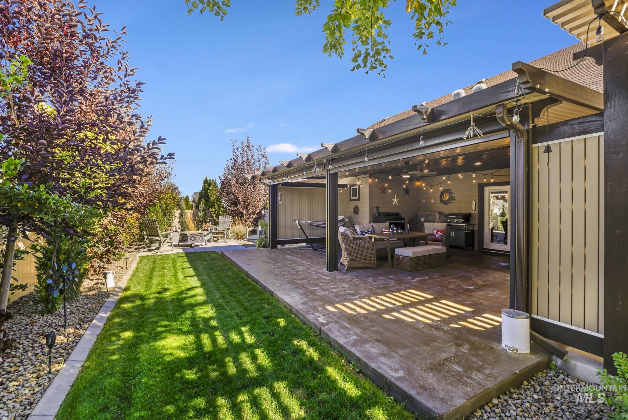 2043 Prospector Way Twin Falls, ID 83301 - Photo 21 of 29 View of yard featuring an outdoor living space and a patio