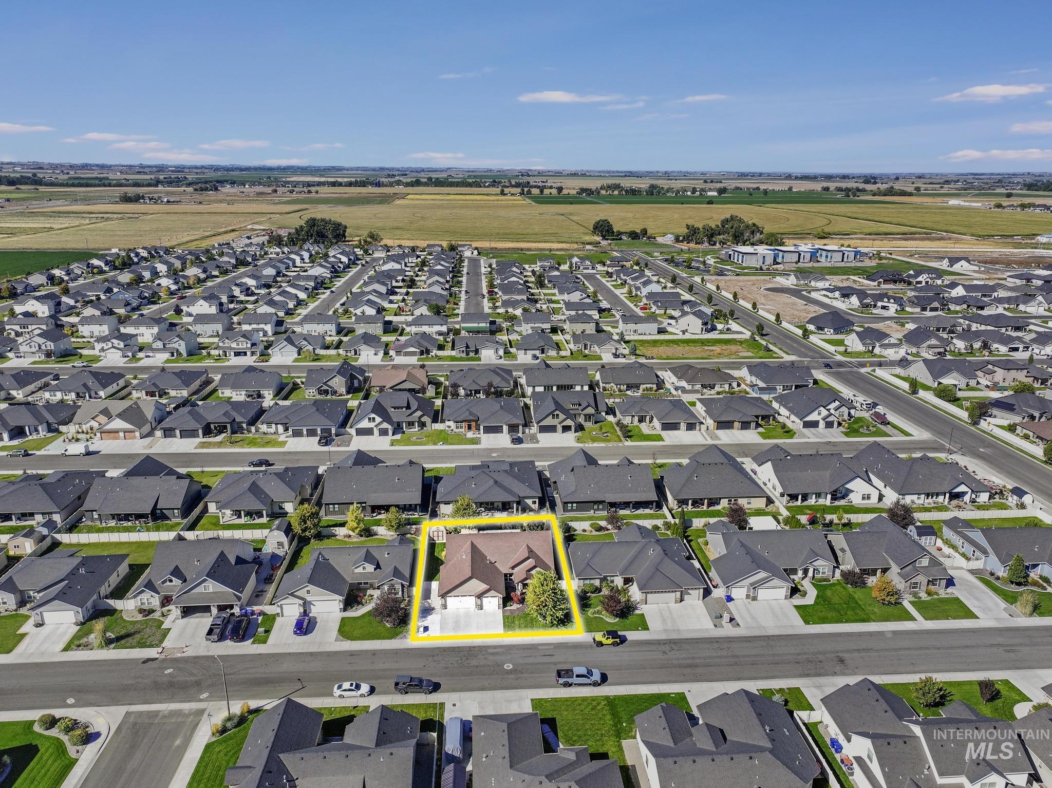 2043 Prospector Way Twin Falls, ID 83301 - Photo 27 of 29 Aerial perspective of suburban area with property parcel outlined
