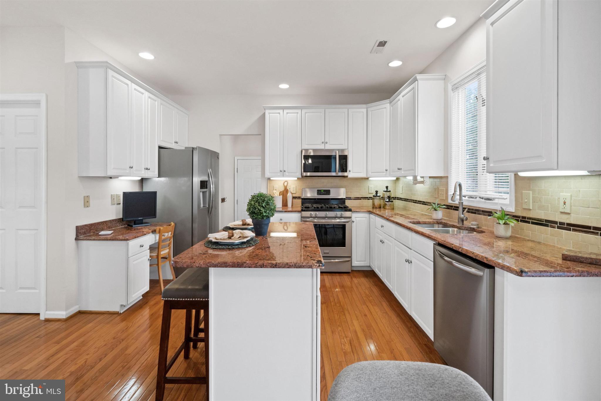 8 Bayberry Close Newark, DE 19711 - Photo 12 of 63 Modern kitchen with sleek finishes.