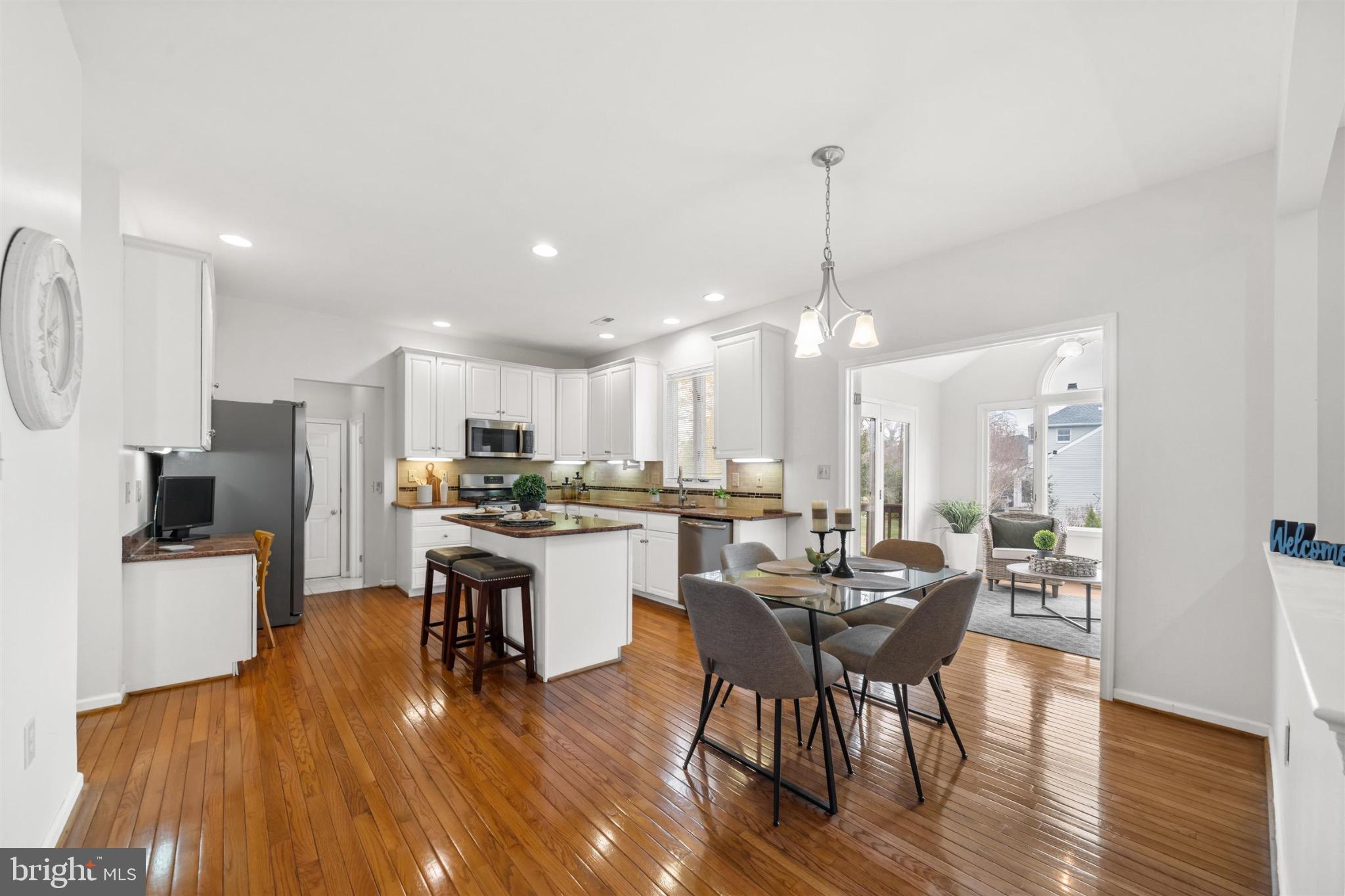 8 Bayberry Close Newark, DE 19711 - Photo 15 of 63 Modern kitchen with warm wooden floors.