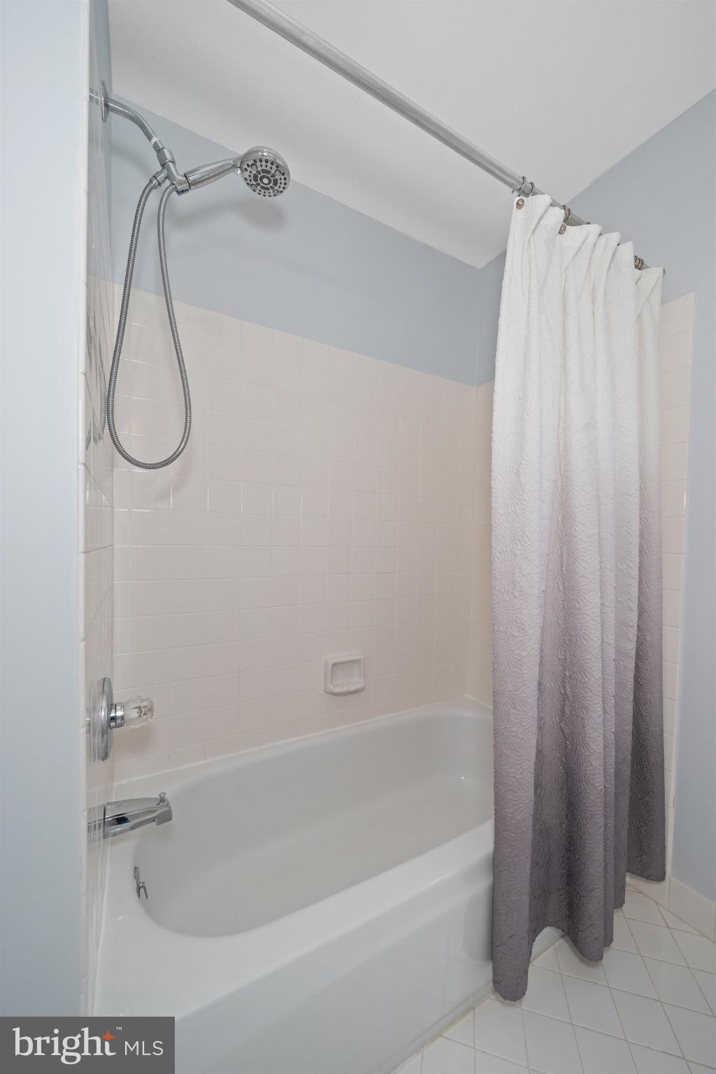 8 Bayberry Close Newark, DE 19711 - Photo 44 of 63 Modern bathroom with sleek tub and shower.