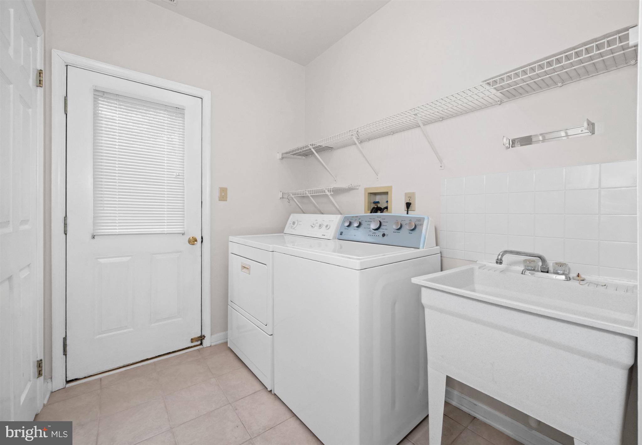 8 Bayberry Close Newark, DE 19711 - Photo 54 of 63 Bright and functional laundry space.
