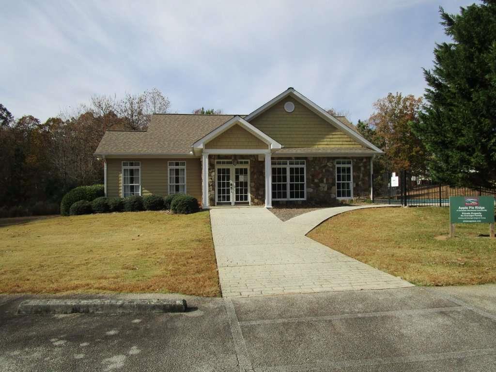 136 Lakeview Way Baldwin, GA 30511 - Photo 7 of 13 a front view of a house with garden