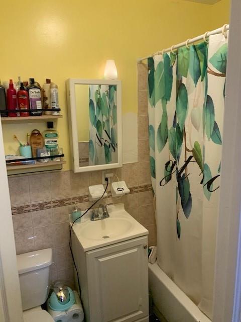 1129 Broadway Brooklyn, NY 11221 - Photo 11 of 15 a bathroom with a sink and toilet