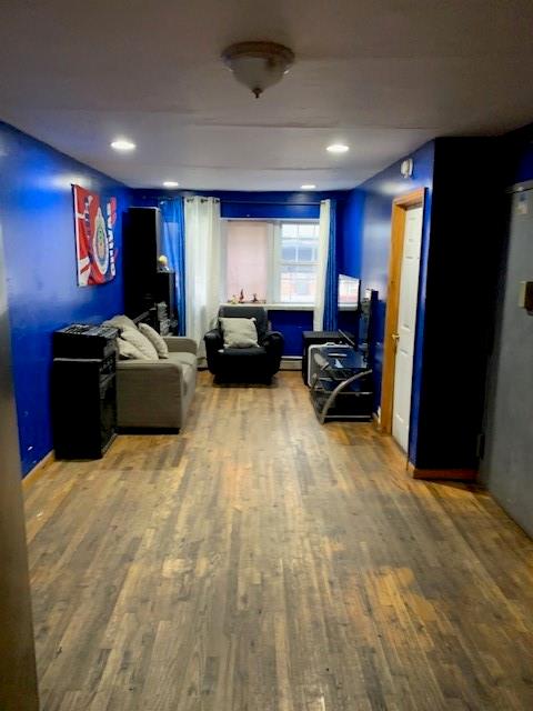 1129 Broadway Brooklyn, NY 11221 - Photo 13 of 15 a living room with furniture window and a flat screen tv