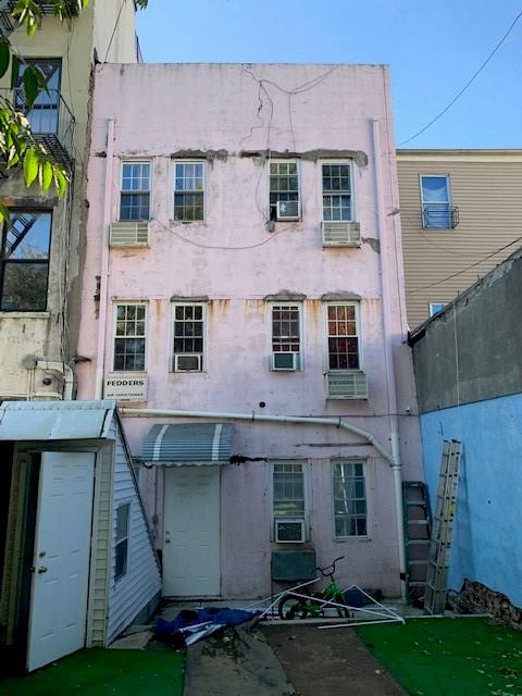 1129 Broadway Brooklyn, NY 11221 - Photo 5 of 15 a view of a building with a yard