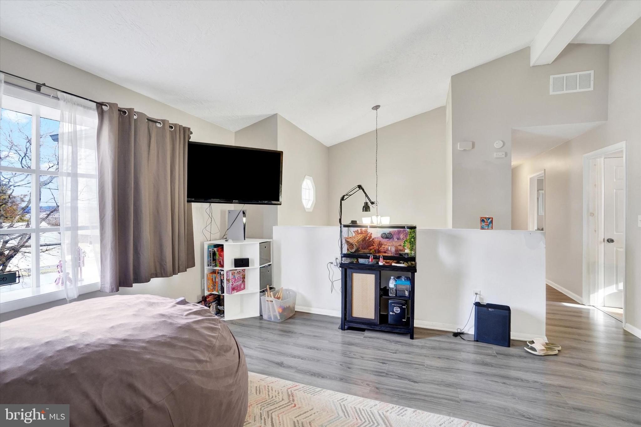 1270 Glendale Road York, PA 17403 - Photo 4 of 31 a living room with furniture and a flat screen tv
