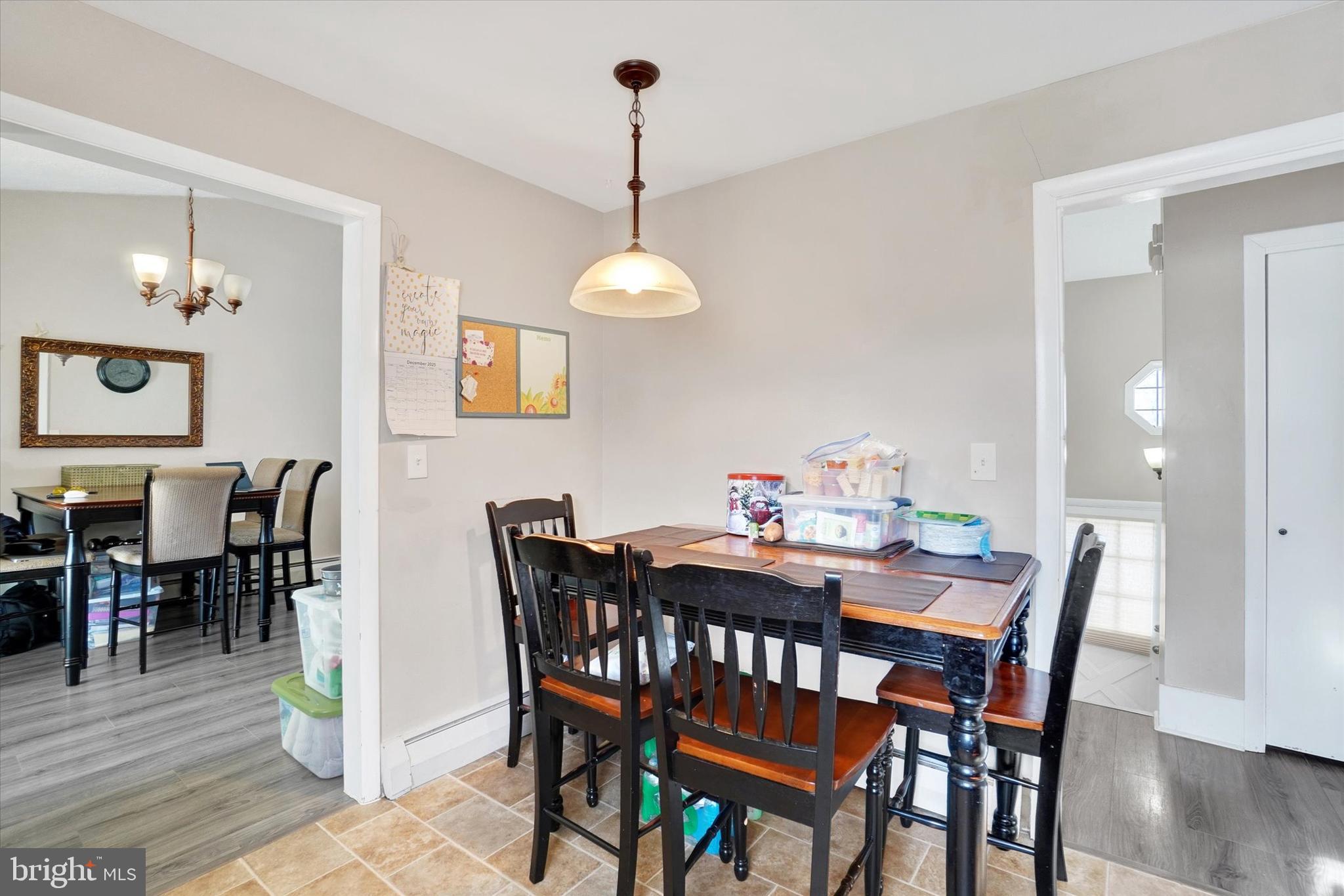 1270 Glendale Road York, PA 17403 - Photo 5 of 31 a view of a dining room with furniture and wooden floor