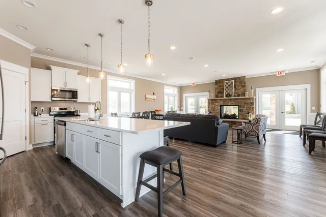 a view of a patio with a table and chairs