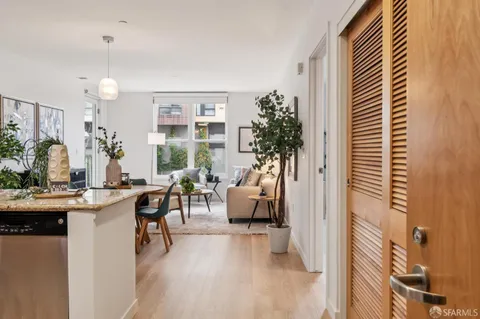 a view of a livingroom with furniture and window