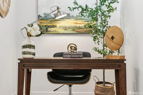 a view of entryway with wooden floor