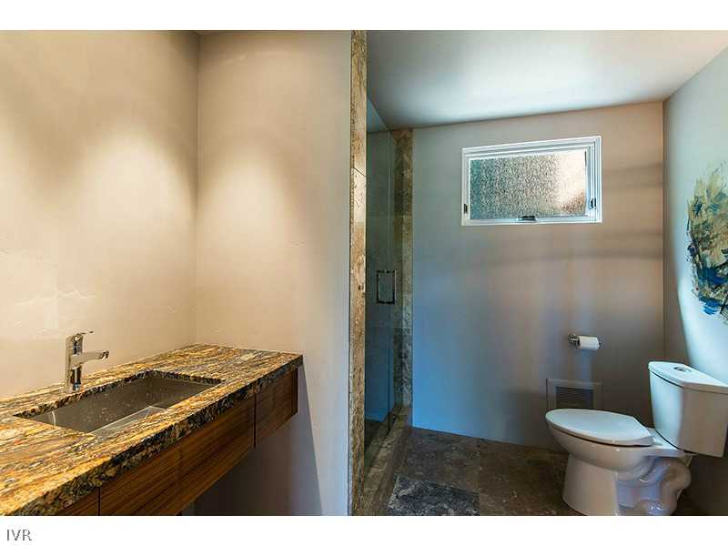 574 Tyner Way Incline Village, NV 89451 - Photo 20 of 34 a bathroom with a granite countertop sink and a toilet