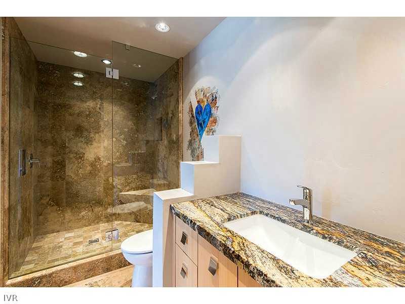574 Tyner Way Incline Village, NV 89451 - Photo 33 of 34 a bathroom with a sink and a mirror