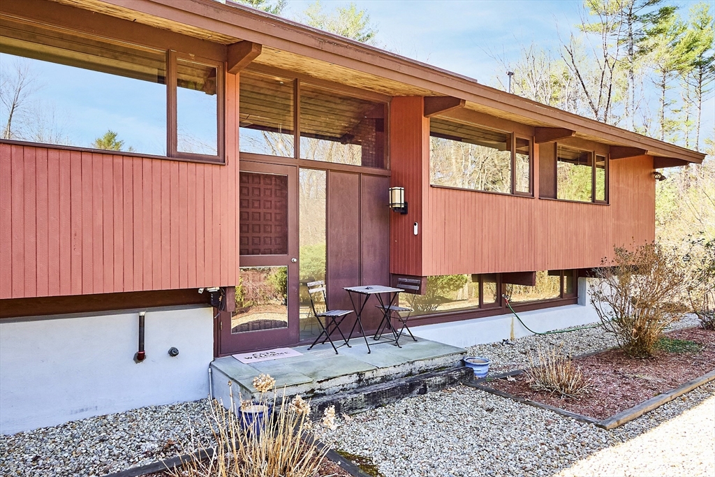 237 Stoney Gate Carlisle, MA 01741 - Photo 1 of 1 a view of a back yard of the house