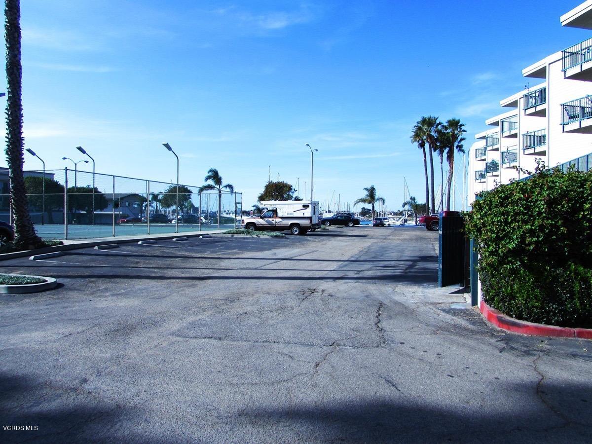 3101 Peninsula Road, Unit 312 Oxnard, CA 93035 - Photo 14 of 14 a view of car parked on the side of a road