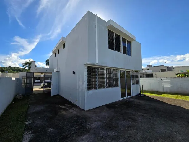 a view of swimming pool with a yard