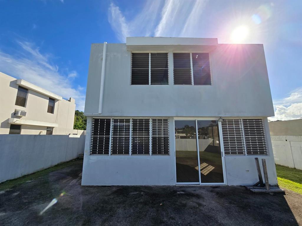 9 C. Rio La Plata, Unit 9E Bogalusa, LA 70427 - Photo 24 of 29 a view of a house with a yard