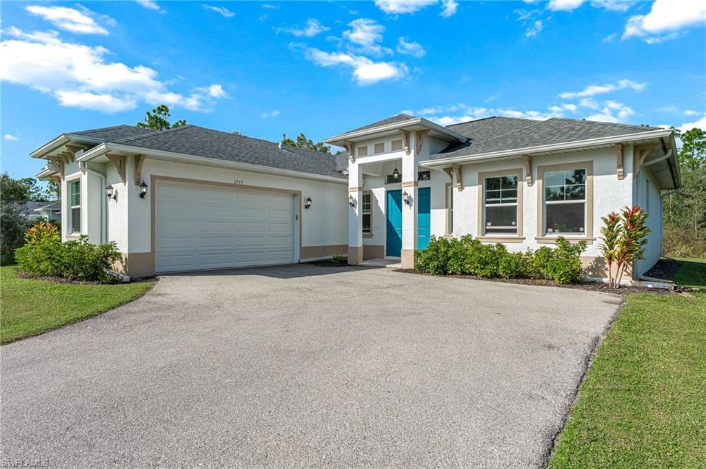 2793 72nd Avenue Northeast Naples, FL 34120 - Photo 4 of 50 front view of a house with a street
