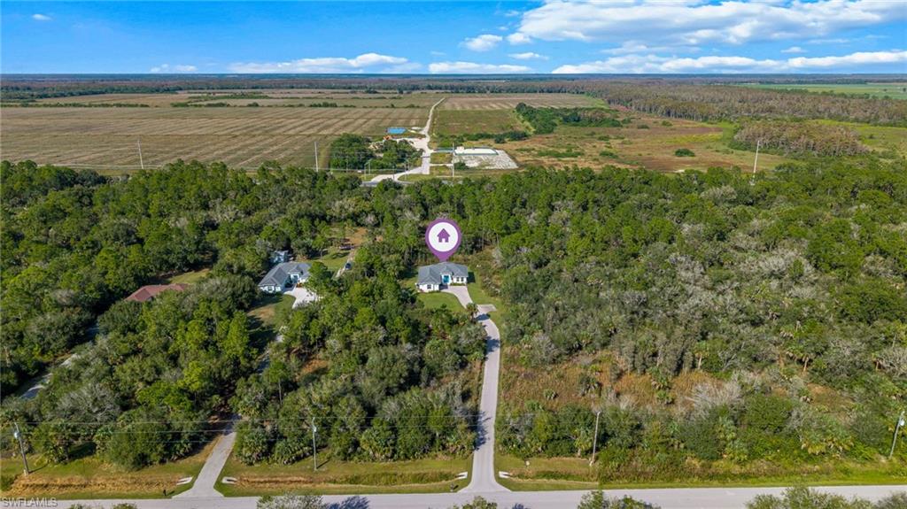 2793 72nd Avenue Northeast Naples, FL 34120 - Photo 43 of 50 a view of an outdoor space and a lake view
