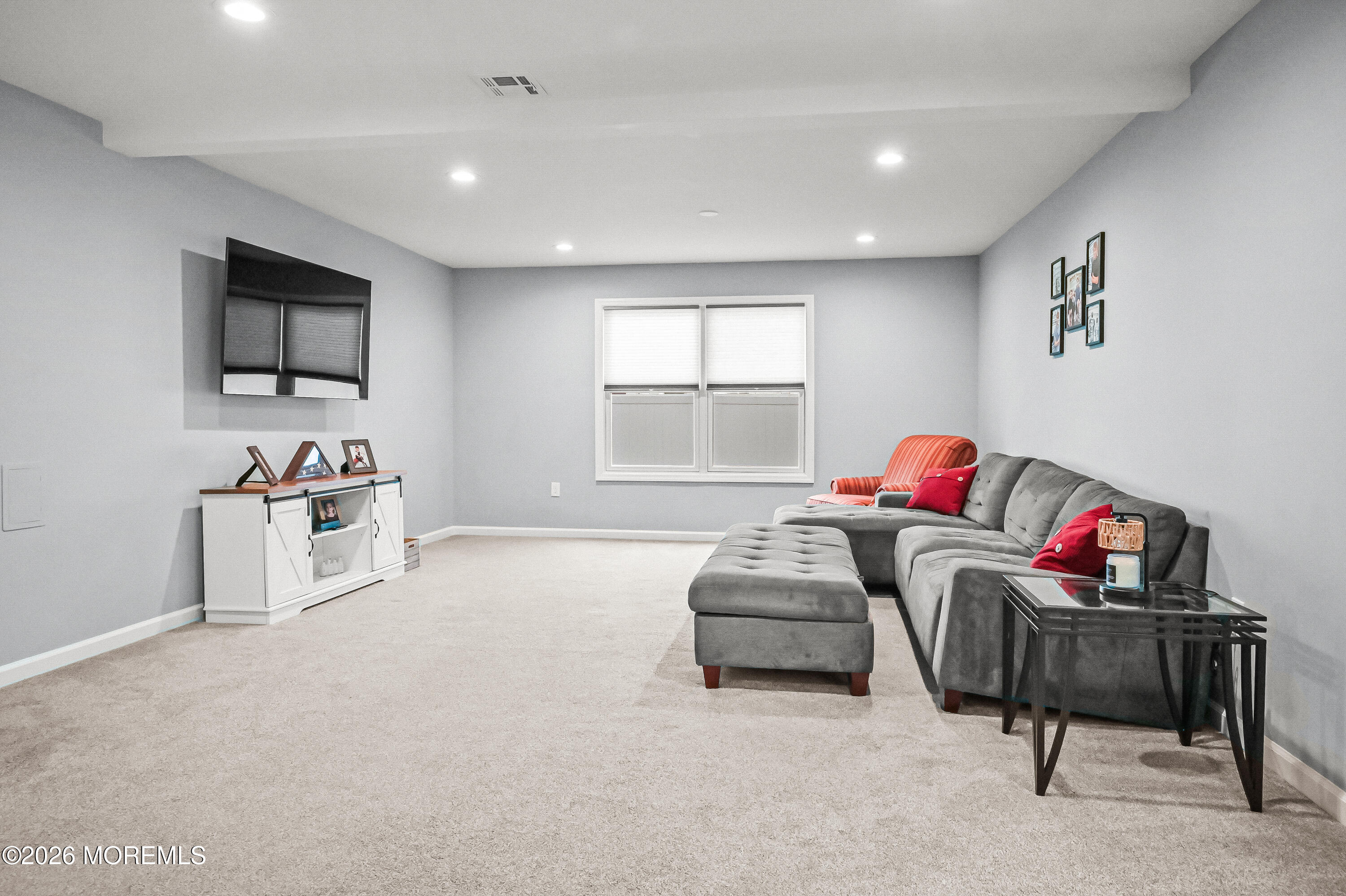 5 Limerick Place Hazlet, NJ 07730 - Photo 16 of 47 a living room with furniture and a flat screen tv