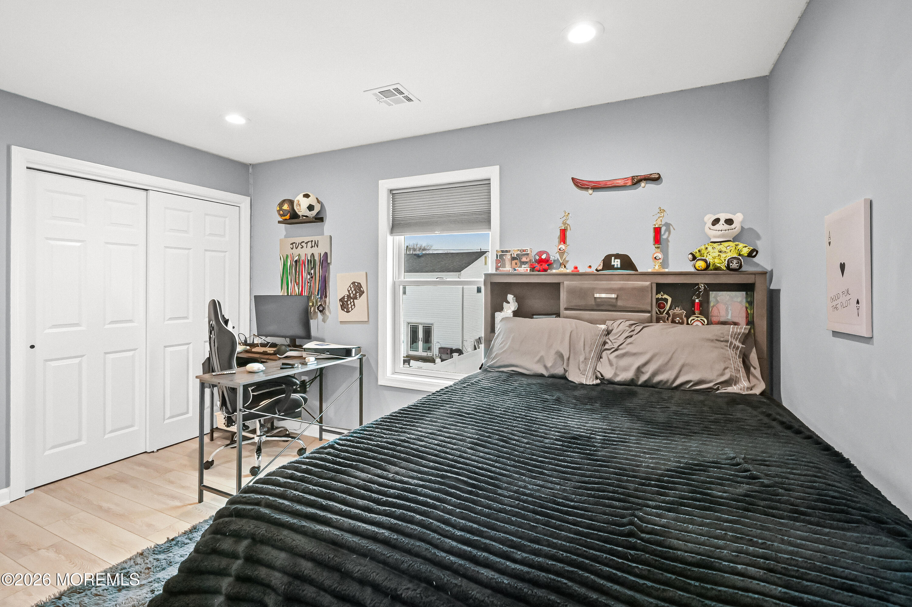5 Limerick Place Hazlet, NJ 07730 - Photo 27 of 47 a bedroom that has a bed and a table in it