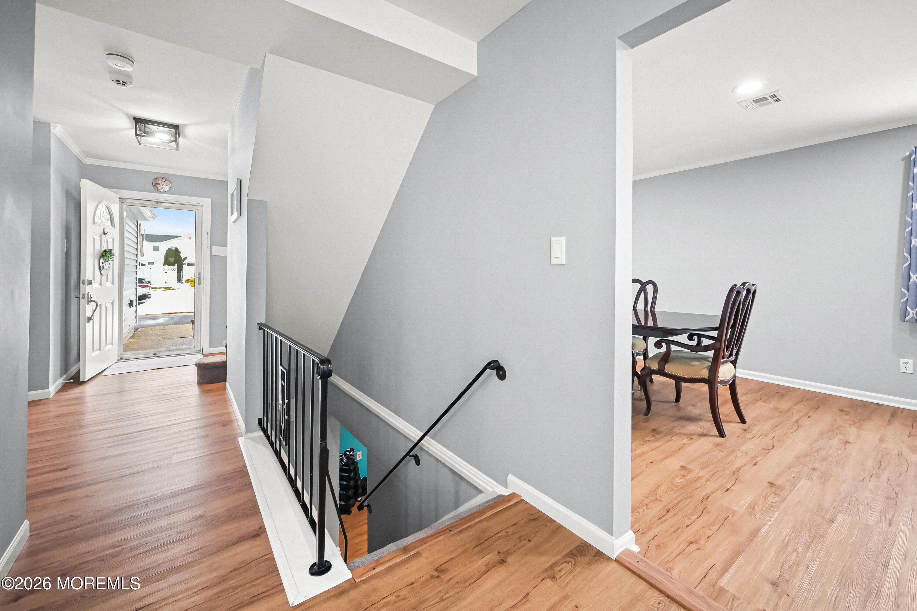 5 Limerick Place Hazlet, NJ 07730 - Photo 35 of 47 a view of a hallway with wooden floor and furniture