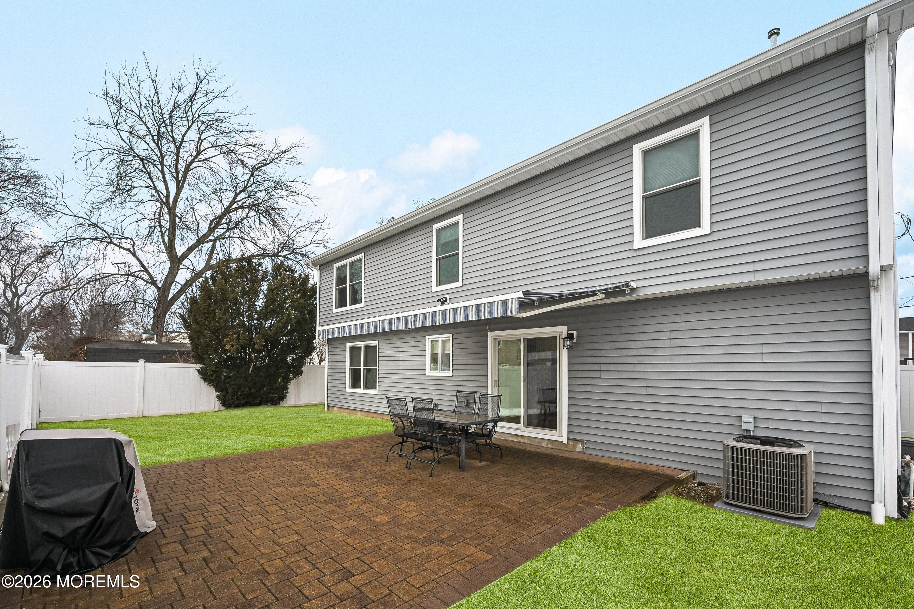 5 Limerick Place Hazlet, NJ 07730 - Photo 5 of 47 a view of a house with a backyard