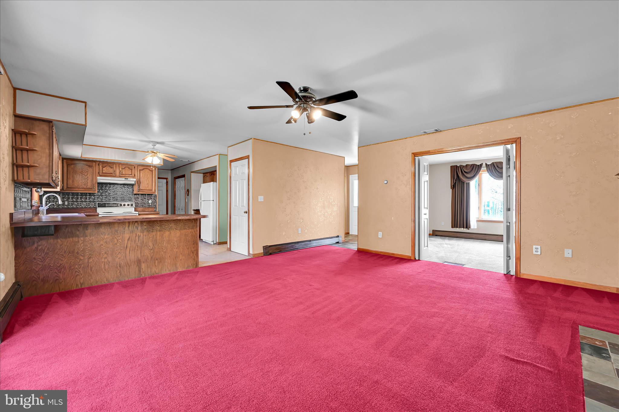 1039 Summer Hill Road Auburn, PA 17922 - Photo 11 of 40 a bed room with a bed and a chandelier