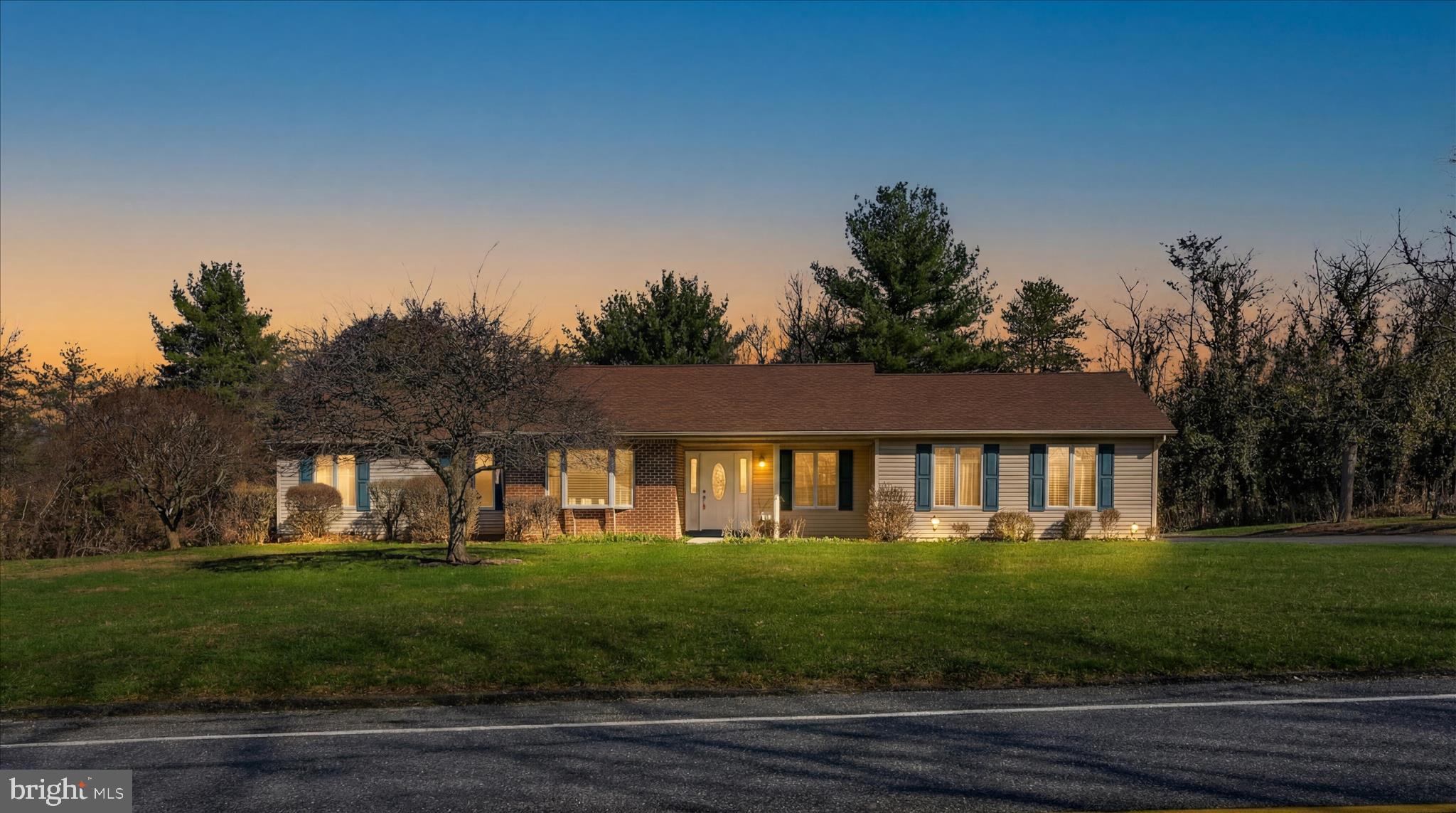 1039 Summer Hill Road Auburn, PA 17922 - Photo 2 of 40 a front view of a house with a yard