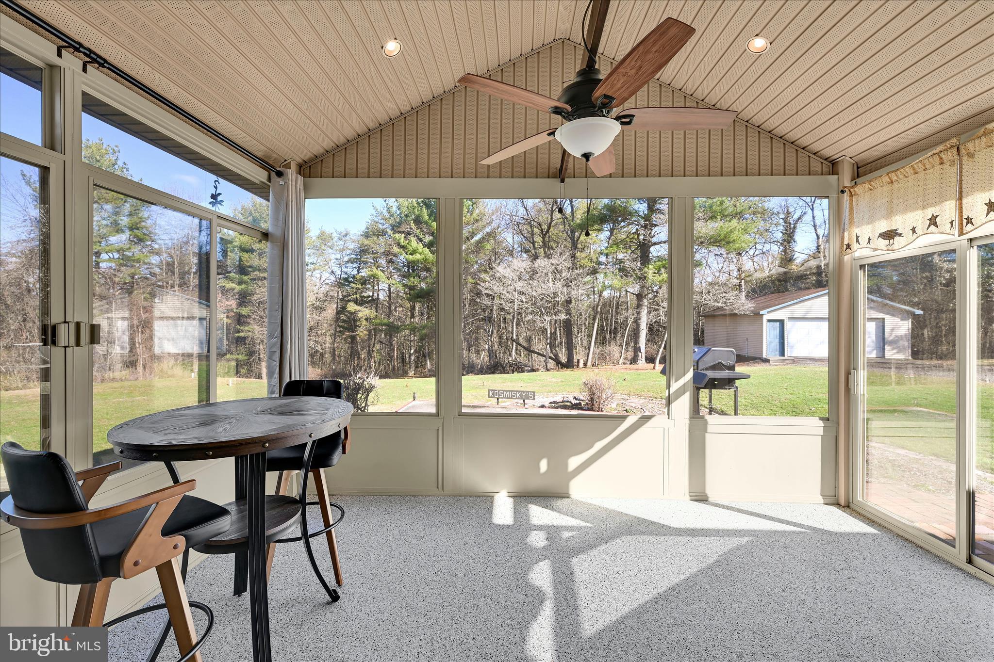 1039 Summer Hill Road Auburn, PA 17922 - Photo 21 of 40 a view of a dining room with furniture wooden floor and a chandelier