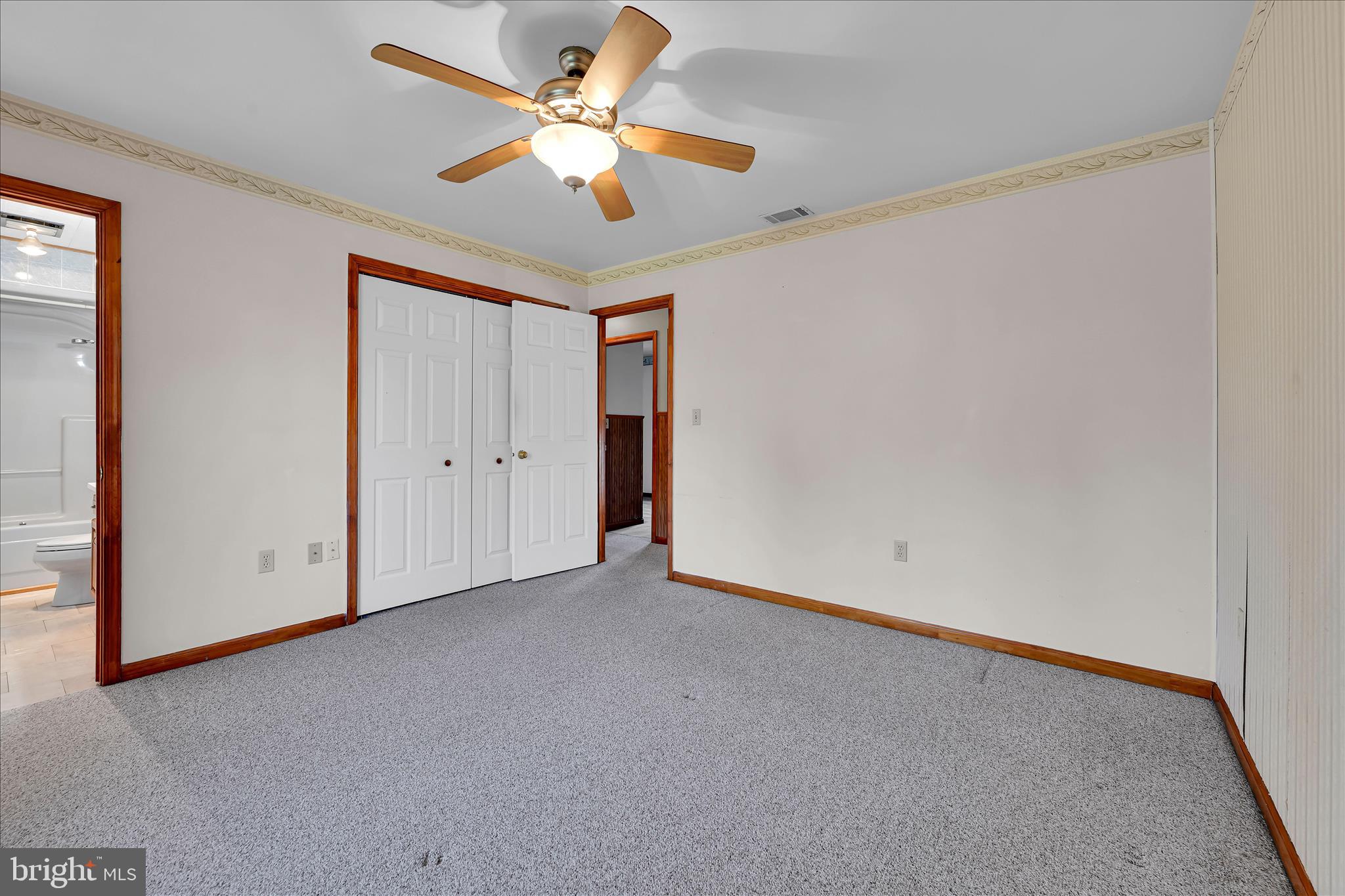 1039 Summer Hill Road Auburn, PA 17922 - Photo 24 of 40 an empty room with a ceiling fan and a window