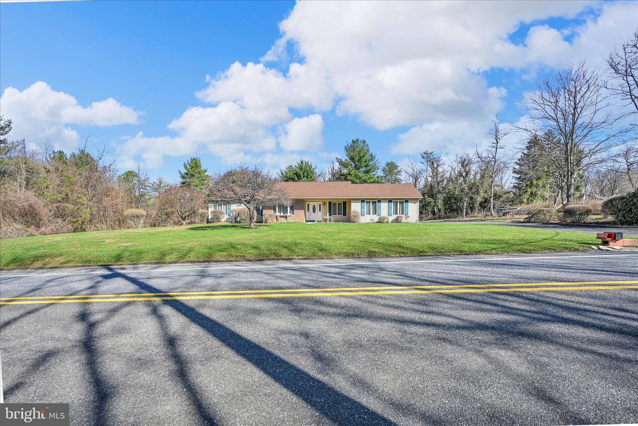 1039 Summer Hill Road Auburn, PA 17922 - Photo 3 of 40 a view of a town with brick building