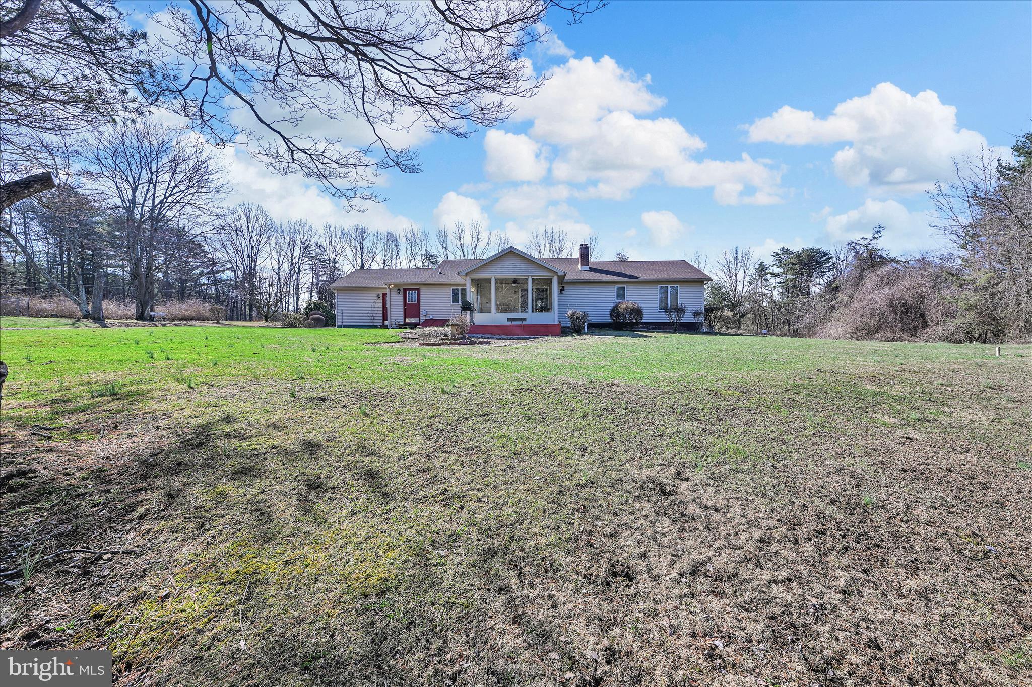 1039 Summer Hill Road Auburn, PA 17922 - Photo 31 of 40 a view of a big house with a big yard and large trees