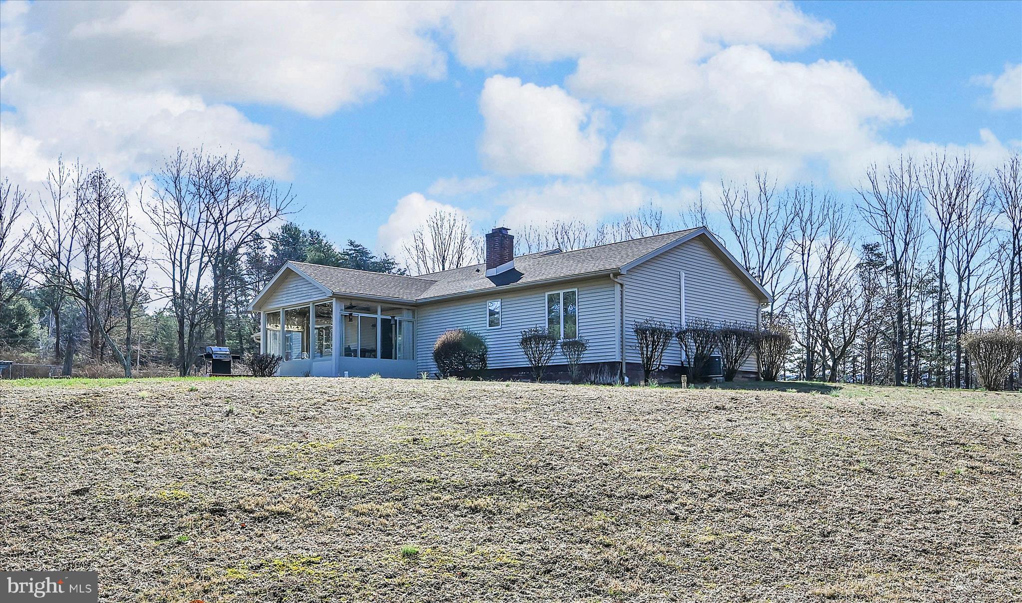1039 Summer Hill Road Auburn, PA 17922 - Photo 34 of 40 a view of a house with a yard covered with snow