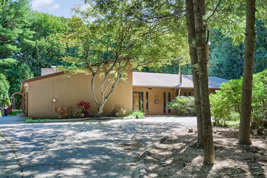 18 Old Lantern Circle Paxton, MA 01612 - Photo 3 of 41 a front view of a house with a yard