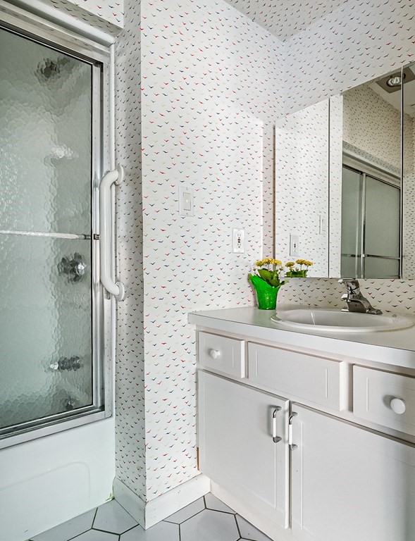 18 Old Lantern Circle Paxton, MA 01612 - Photo 32 of 41 a bathroom with a granite countertop sink a toilet and shower