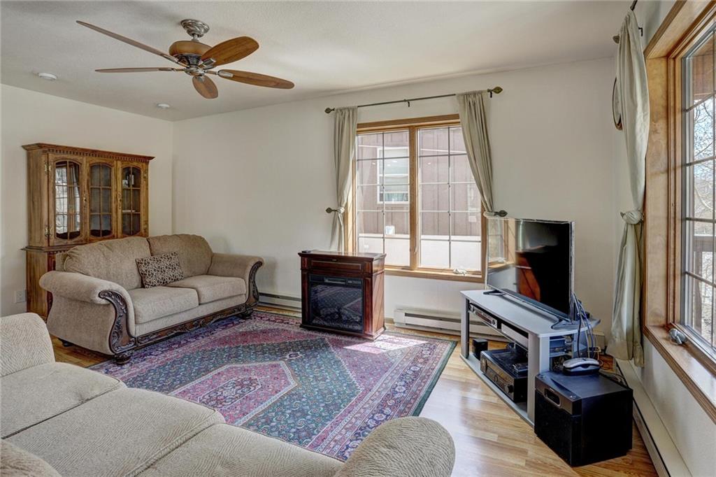 47 West Hansen Road Keystone, CO 80435 - Photo 11 of 35 a living room with furniture a flat screen tv and a window