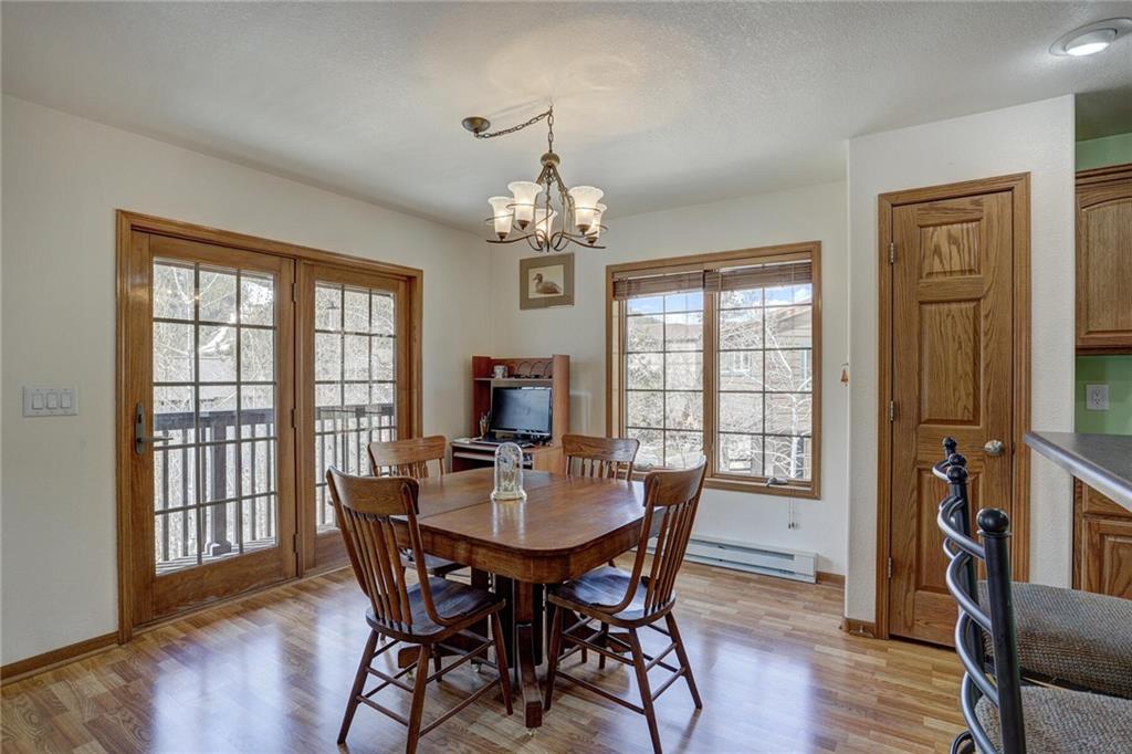 47 West Hansen Road Keystone, CO 80435 - Photo 12 of 35 a view of a dining room with furniture window and wooden floor