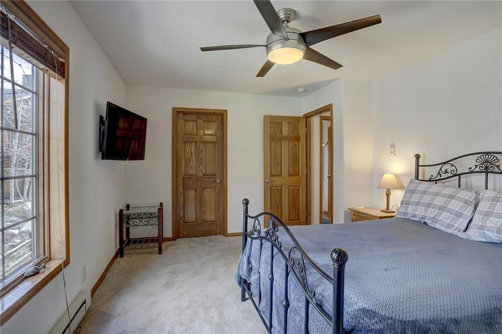 47 West Hansen Road Keystone, CO 80435 - Photo 21 of 35 a bedroom with furniture and a flat screen tv