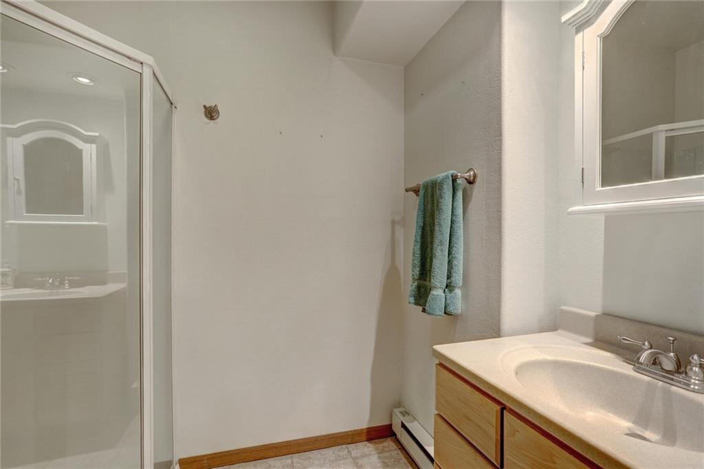 47 West Hansen Road Keystone, CO 80435 - Photo 28 of 35 a bathroom with a sink and a mirror