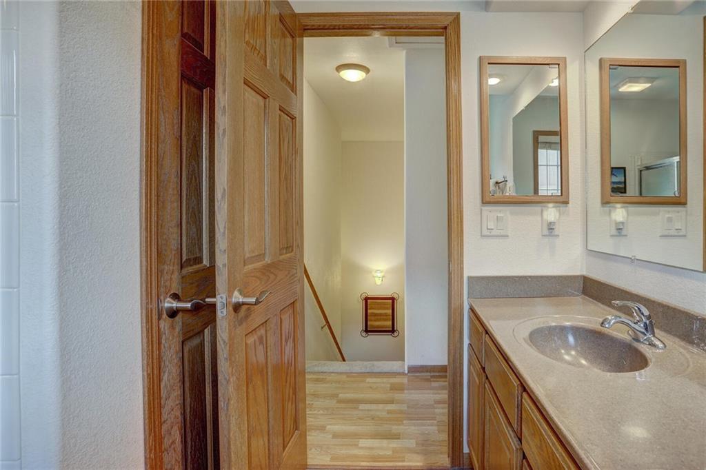 47 West Hansen Road Keystone, CO 80435 - Photo 30 of 35 a bathroom with a sink a toilet and shower