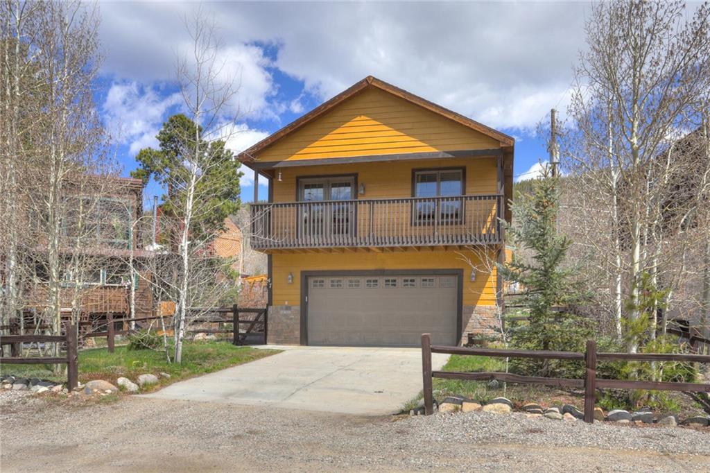 47 West Hansen Road Keystone, CO 80435 - Photo 35 of 35 a front view of a house with a yard and garage