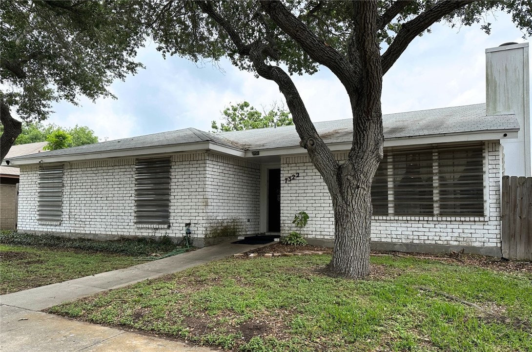 7322 Pepper Ridge Road Corpus Christi, TX 78413 - Photo 1 of 11 a front view of a house with garden