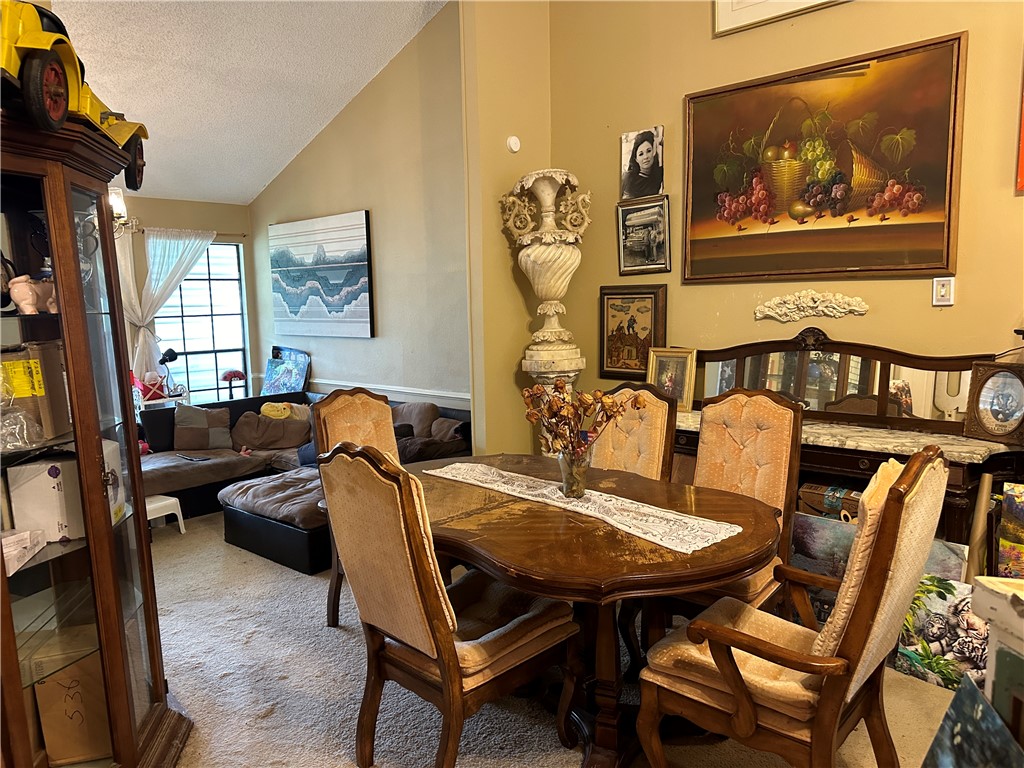 7322 Pepper Ridge Road Corpus Christi, TX 78413 - Photo 5 of 11 a living room with furniture and a flat screen tv